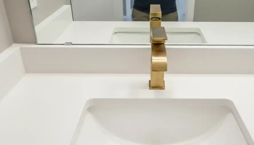 Modern sink and mirror in Signal Hill bathroom